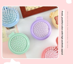 Foldable macaron pastel cushion hair brush with integrated mirror in various cute colors