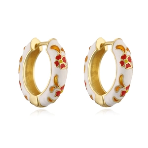 Detail of 18K gold-plated C-shape hoop earrings with white enamel and floral patterns