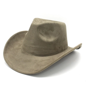 Macro detail of brown faux suede texture on a wide-brimmed classic western cowboy hat