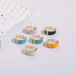 Detailed display of six multi-colored enamel evil eye open rings in 14K gold plating