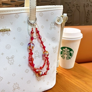Bijou de sac à double chaîne en cristal rouge avec perles étoiles et feuille d'or