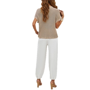 Women's knit two-piece set with beige short sleeve top and white casual cropped pants