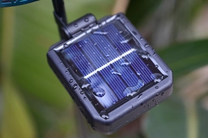 Close-up of waterproof solar panel with water droplets for garden decorative light