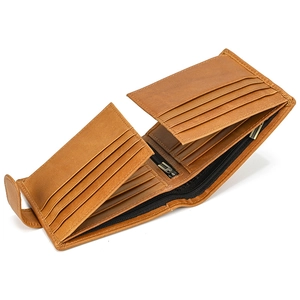 Detail view of brown leather tri-fold wallet with multiple card slots and zipper pocket