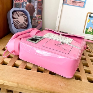 Retro pink rotary phone crossbody bag with glossy PU finish and vintage printed details