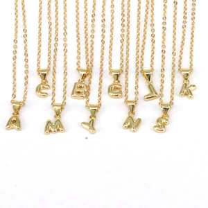 Minimalist gold initial letter necklaces on thin chains for women and girls