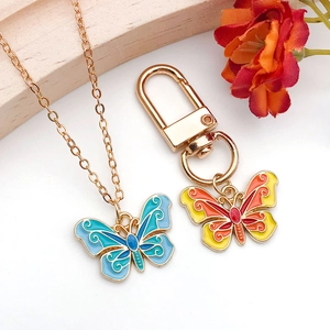 Alloy enamel butterfly charms for jewelry making featuring blue and orange pendants