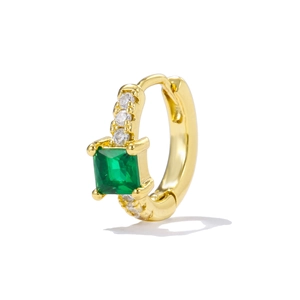 Detail of gold huggie hoop earring with square emerald gemstone and white zircon stones