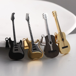 Detail view of four guitar shaped pendants in black, gold, and silver finishes