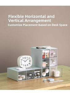 Close-up of modular desk organizer with mint green frame and translucent drawer handles