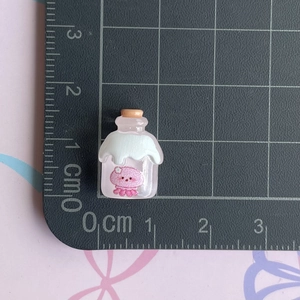 Miniature pink resin wishing bottle accessory with cute pig icon and 1.5cm size scale