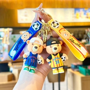 Adorable bear mascot football keychains in blue and yellow with silicone wristbands