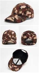 Detail view of camouflage corduroy baseball cap with metal buckle and inner lining