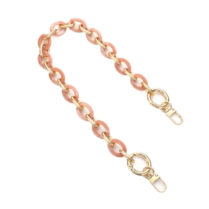 Pink acrylic resin bag strap with gold metal rings and lobster clasps for women
