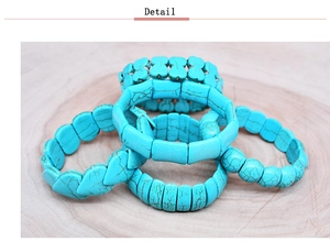Detailed macro view of bohemian turquoise stretch bracelets with various stone shapes