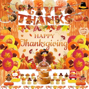 Detail view of Thanksgiving party set with banners, balloons and themed tableware
