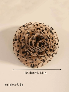 Macro shot of a 10.5cm leopard print mesh rose brooch and hair clip for women