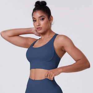 Detail of navy blue brushed matte sports bra set with wide straps and high waist fit