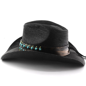 Detail of black woven cowboy hat with ethnic beaded band and yellow stitching