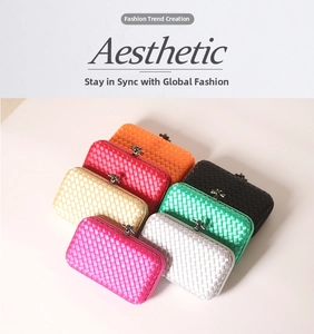 Polyester evening clutch bag with woven texture and metal knot clasp in seven colors