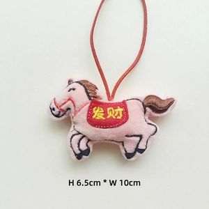 Pink plush horse keychain with red saddle and Chinese embroidery, size 10x6.5cm