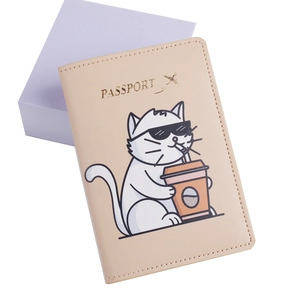 Close-up of beige PU leather passport holder featuring a cute cartoon cat print