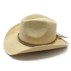Straw western cowboy hat with studded ethnic band and rhinestones in natural beige