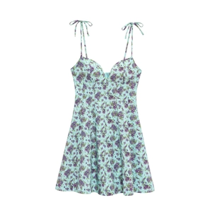 Detail of light blue floral poplin dress with purple print and tie-up shoulder straps