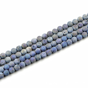 Detailansicht von 10mm blauen Natursteinperlen mit Felsstruktur für DIY-Schmuckherstellung