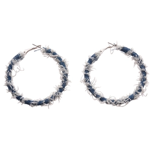 Blue denim wrapped large hoop earrings with frayed fringe edges on a white background