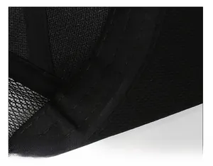 Detail shot of a black mesh cap showing thick moisture-wicking sweatband and fine stitching