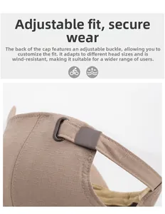 Detailed view of khaki baseball cap with adjustable dark grey metal buckle for a secure fit