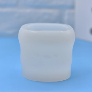 Translucent white silicone mold for DIY soap and candle making in a cylinder shape