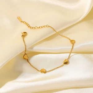 Bracciale in acciaio inossidabile placcato oro 18K con quattro cuori su seta beige
