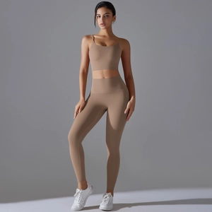 Detail of high-impact coffee yoga set with thin strap sports bra and high-waisted leggings