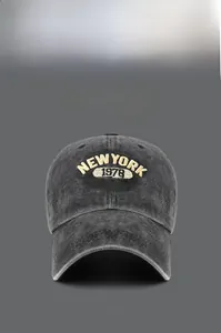 Close-up of vintage washed cotton baseball cap featuring 3D New York 1978 embroidery