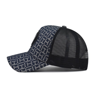 Side view of gradient baseball cap with H pattern texture and breathable black mesh back