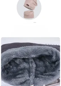 Close-up of winter knit hat set showing thick grey plush lining for thermal insulation