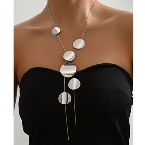 Silver Y-shaped long necklace with geometric circular pendants shown on model