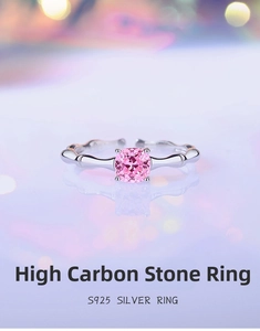 Detail of S925 silver ring featuring a pink cushion-cut stone and bamboo texture