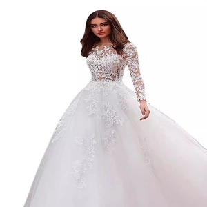 Robe de mariée élégante en dentelle blanche à manches longues et jupe en tulle évasée