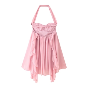 Detail of pink halter neck mini dress featuring ruffled side layers and backless design