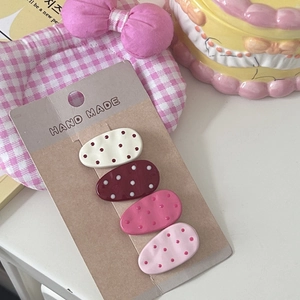 4-pack of oval polka dot hair clips in cream, red, pink colors for women hair styling