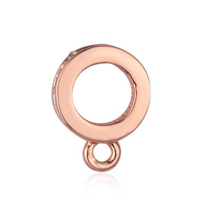 Macro detail of rose gold bail connector with micro-inlaid cubic zirconia stones
