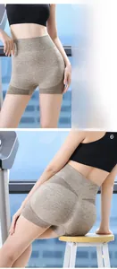 Detail of high-waisted seamless fitness shorts with breathable mesh and moisture-wicking fabric