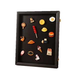 Black wooden magnetic display frame for 3D food magnets and collectibles on white background