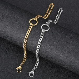 Detail of gold and silver double-layer stainless steel hip hop chain with lobster clasp