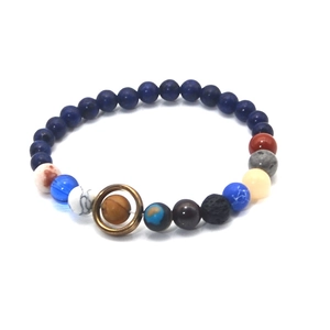 Detailed view of solar system bead bracelet with blue lapis and planet-inspired stones