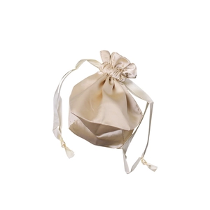 Elegant champagne satin drawstring storage bag with silky ribbon tie for luxury packaging