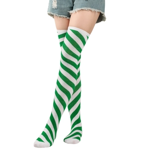 Detail shot of green and white diagonal striped over-the-knee socks on white background